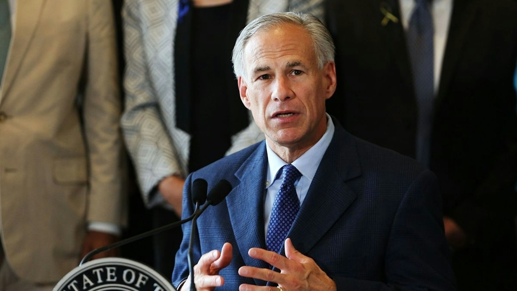 Texas Governor Greg Abbott speaks at Dallas's City Hall near the area that is still an active crime scene in downtown Dallas following the deaths of five police officers last night on July 8, 2016 in Dallas, Texas.