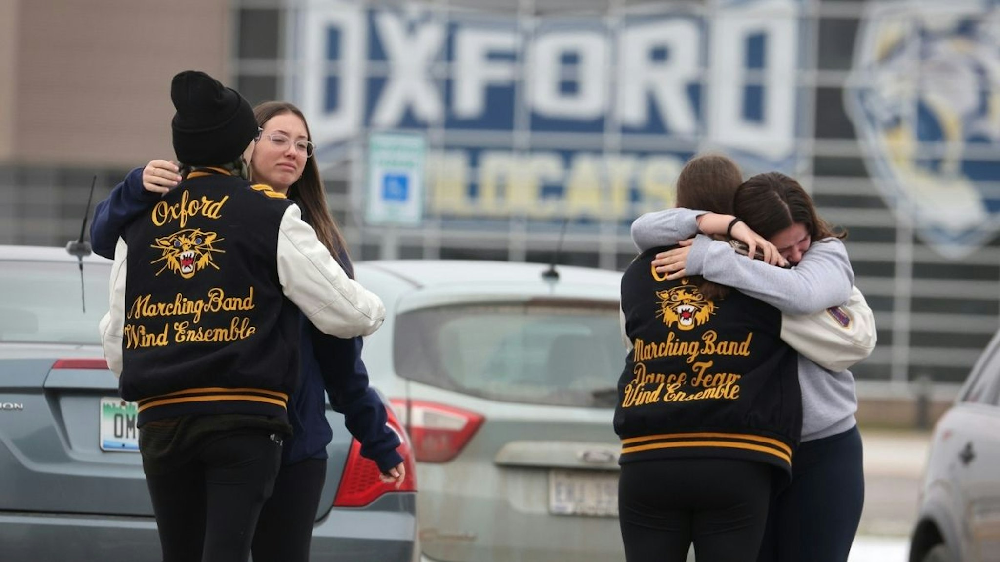 Students embrace as they return to Oxford High School on December 01, 2021 in Oxford, Michigan.