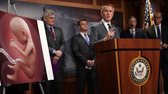 U.S. Sen. James Lankford (R-OK) speaks as (L-R) Sen. Bill Cassidy (R-LA), Sen. Todd Young (R-IN), Sen. Steven Daines (R-MT) and Senate Minority Whip Sen. John Thune (R-SD) listen during a news conference on abortion at the U.S. Capitol November 30, 2021 in Washington, DC.