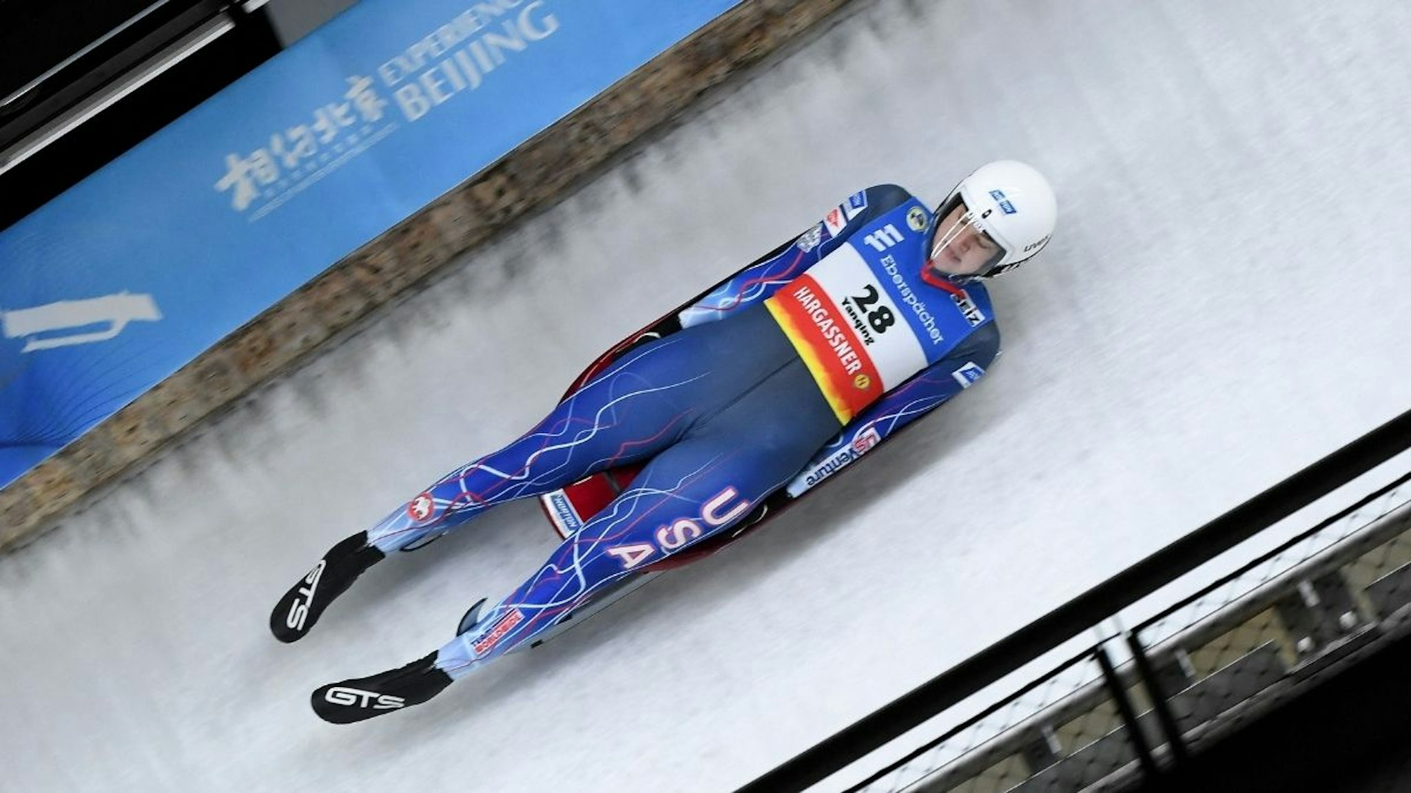 Summer Britcher of US competes in women's single race during the FIL Luge World Cup, part of a 2022 Beijing Winter Olympic Games test event, at the Yanqing National Sliding Center in Beijing on November 21, 2021.