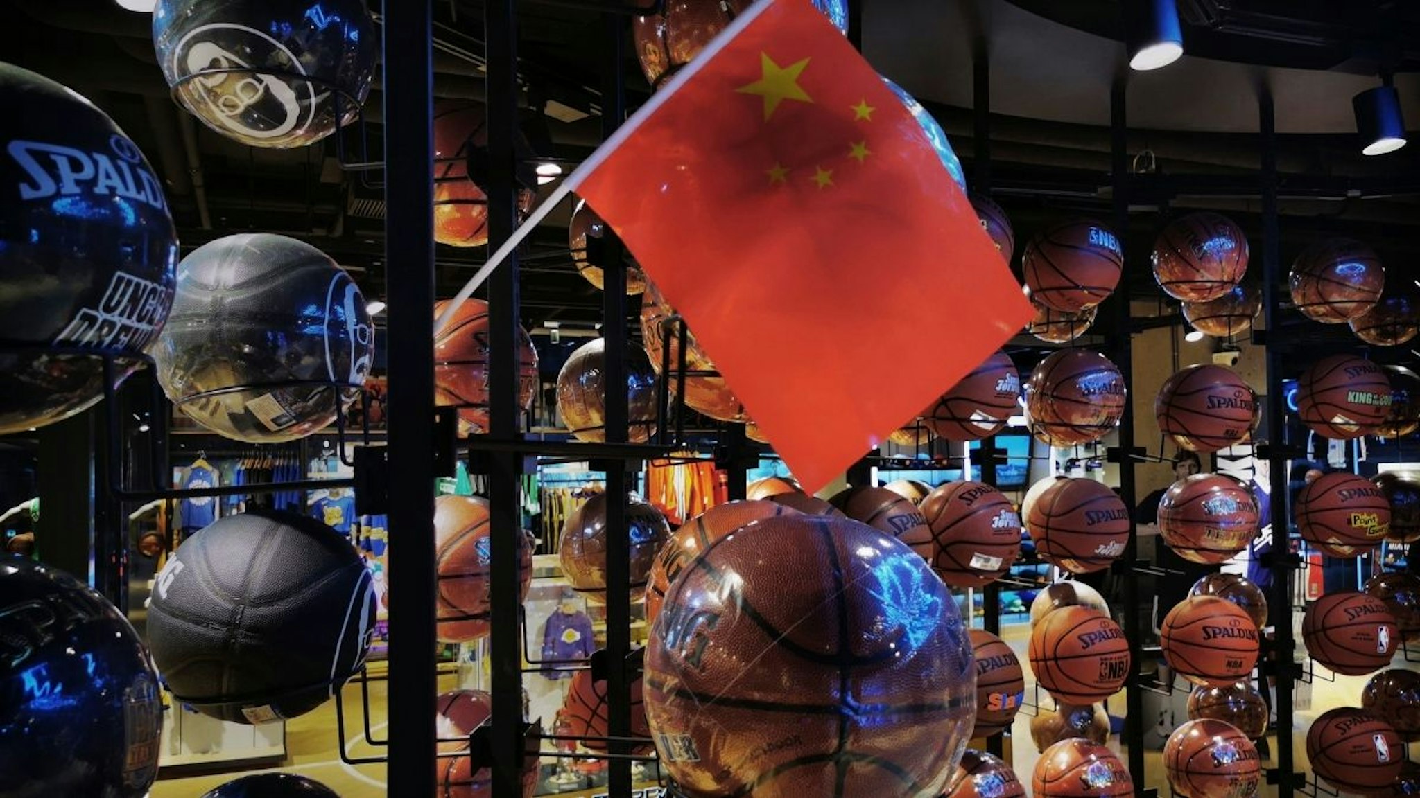 A Chinese flag is seen placed on basketballs in the NBA flagship retail store on October 9, 2019 in Beijing, China.