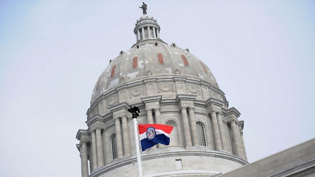 The Missouri state flag is seen flying outside the Missouri State Capitol Building on January 17, 2021 in Jefferson City, Missouri.