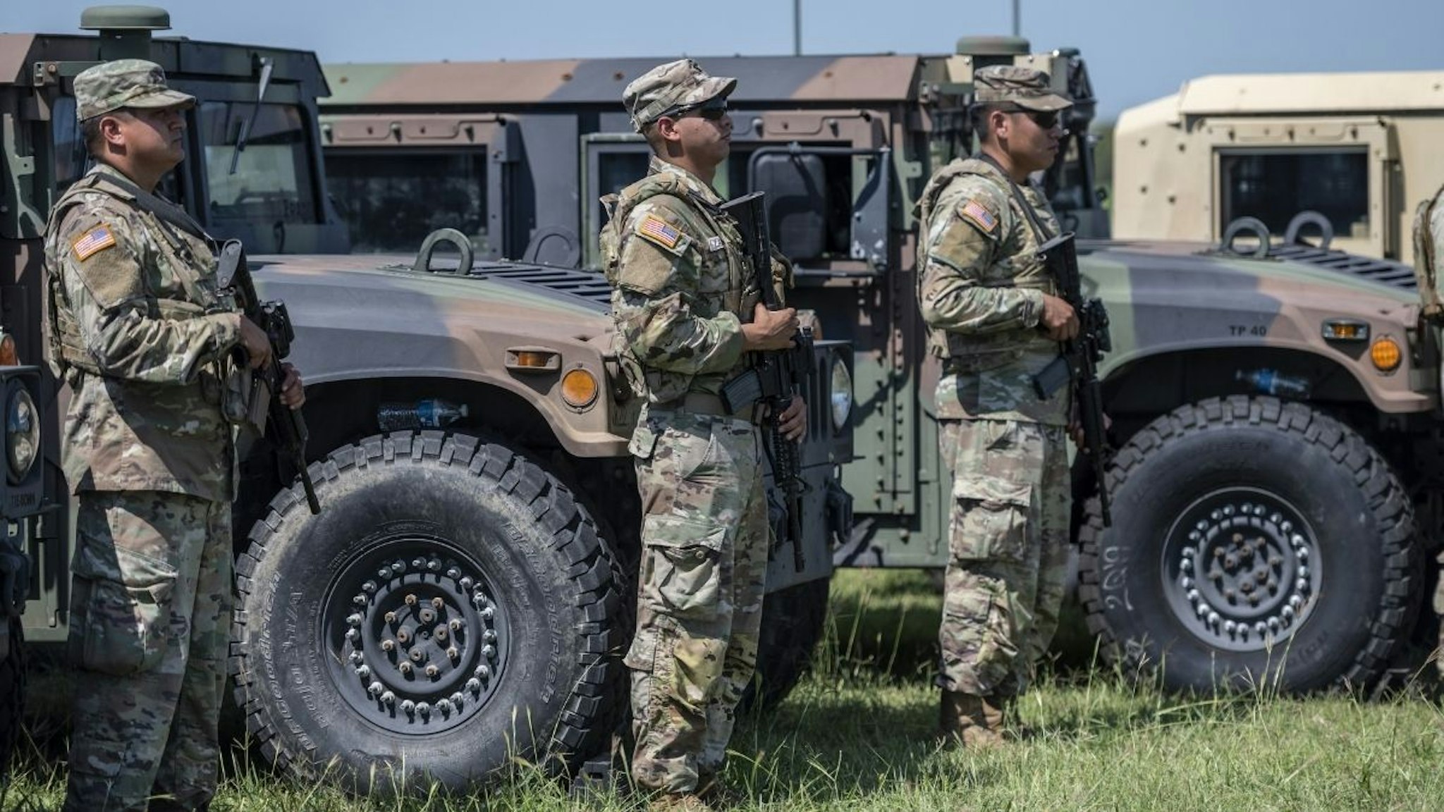 Members of the Texas National Guard during a news conference with Greg Abbott, governor of Texas, not pictured, in Mission, Texas, U.S., on Wednesday, Oct. 6, 2021.