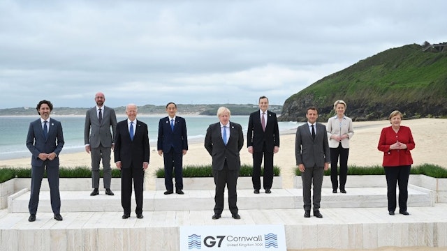 Canadian Prime Minister Justin Trudeau, President of the European Council Charles Michel, US President Joe Biden, Japanese Prime Minister Yoshihide Suga, British Prime Minister Boris Johnson, Italian Prime Minister Mario Draghi, French President Emmanuel Macron, President of the European Commission Ursula von der Leyen and German Chancellor Angela Merkel, pose for the Leaders official welcome and family photo during the G7 Summit In Carbis Bay, on June 11, 2021 in Carbis Bay, Cornwall.