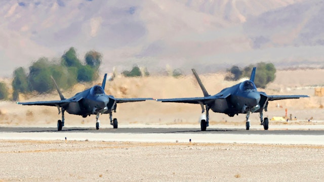Italian air force F-35 fighters prepare for take off during the "Blue Flag" multinational air defence exercise at the Ovda air force base, north of the Israeli city of Eilat, on October 24, 2021. - Israel is holding its largest-ever air force exercise this week, joined by several Western countries and India, with the United Arab Emirates air force chief visiting the drills.
