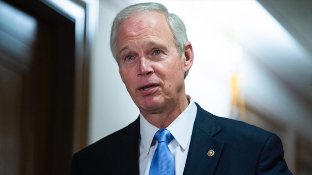 Chairman Ron Johnson, R-Wis., talks with a reporter before the Senate Homeland Security and Governmental Affairs Committee hearing titled Examining Irregularities in the 2020 Election, in Dirksen Building on Wednesday, December 16, 2020.
