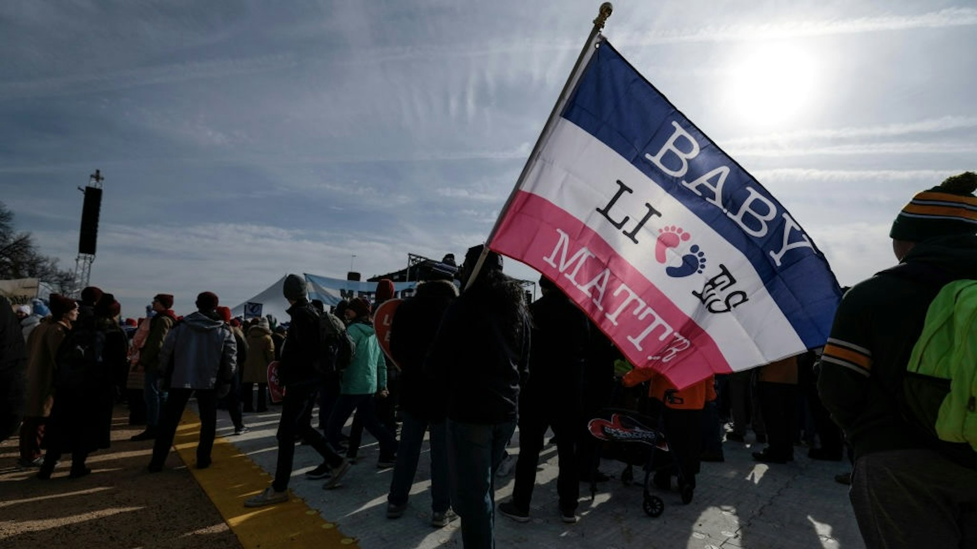 Annual Pro Life Gathering, The March For Life Takes Place In Washington, D.C. WASHINGTON, DC - JANUARY 21: An anti-abortion activist holds a flag saying "Baby Lives Matter" at the 49th annual March for Life rally on the National Mall on January 21, 2022 in Washington, DC. The rally draws activists from around the country who are calling on the U.S. Supreme Court to overturn the Roe v. Wade decision that legalized abortion nationwide. Anna Moneymaker / Staff