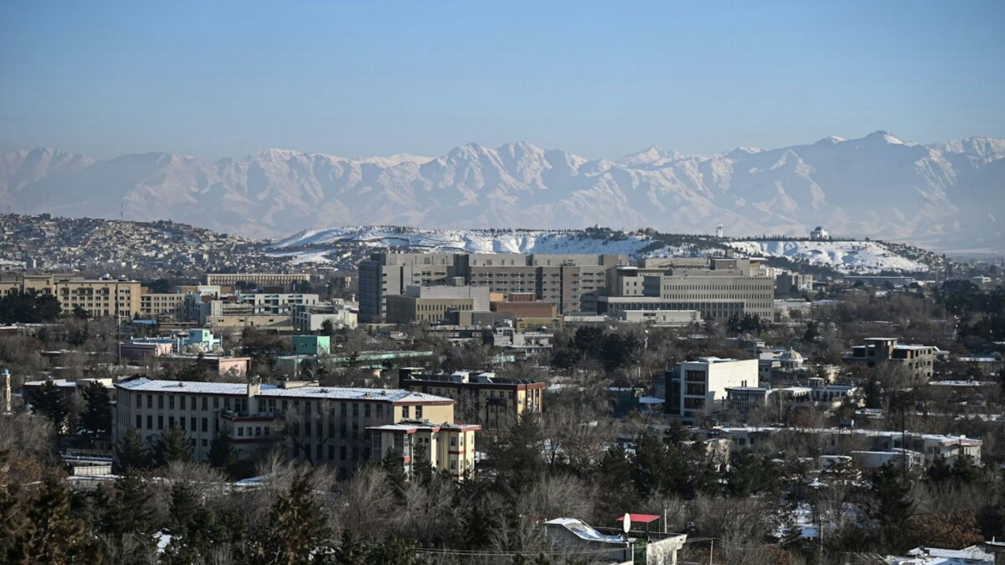 A general view of the Kabul city is seen from atop a hill at Wazir Akbar Khan hill in Kabul on January 10, 2022.