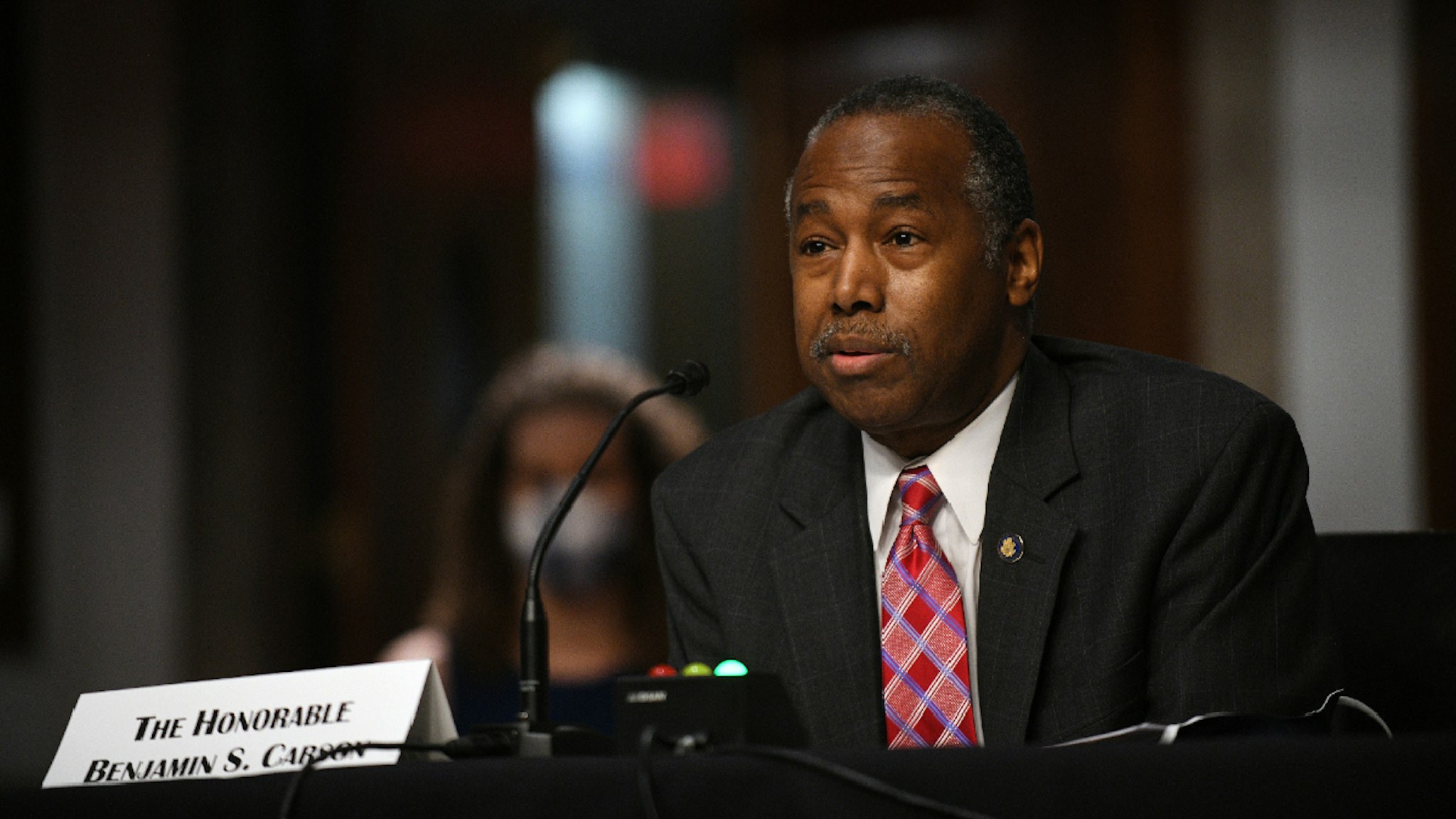 WASHINGTON, DC - JUNE 9: Ben Carson, U.S. Secretary of the U.S. Department of Housing and Urban Development, answers questions before the U.S. Senate Committee on Banking, Housing, and Urban Affairs to examine housing regulations during the pandemic on Capitol Hill in Washington, DC.