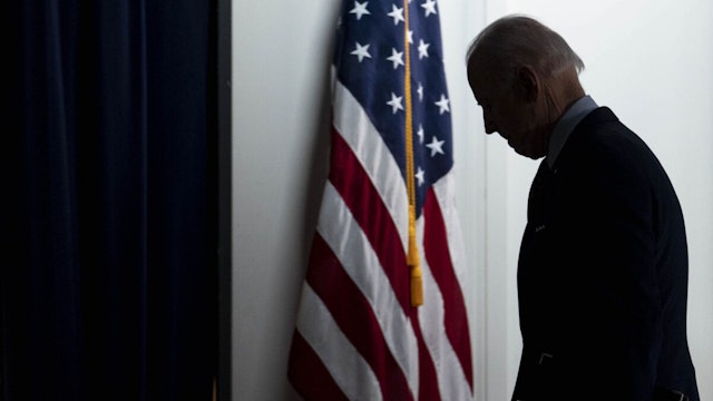 U.S. President Joe Biden exits after speaking in the Eisenhower Executive Office Building in Washington, D.C., U.S., on Wednesday, April 21, 2021.