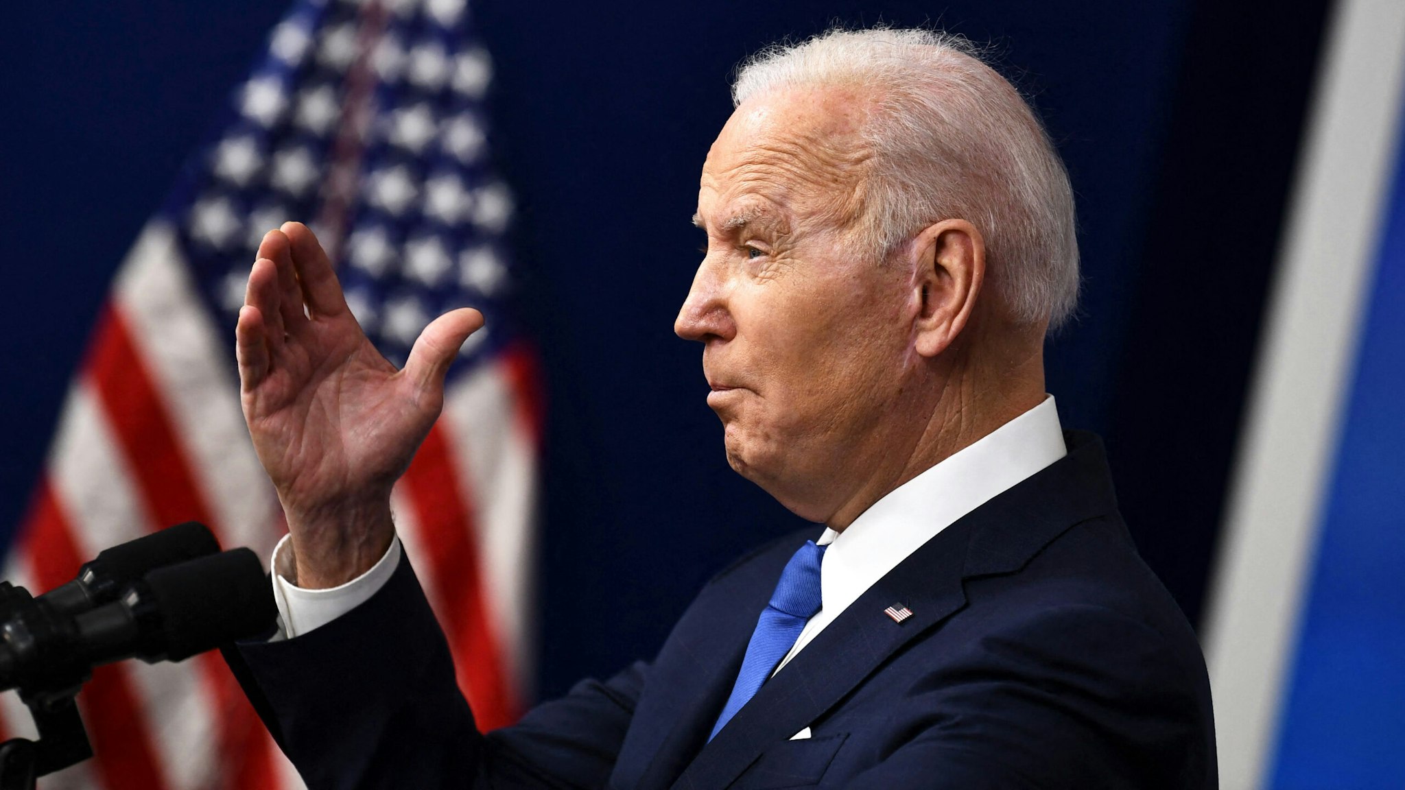 US President Joe Biden speaks about how the Bipartisan Infrastructure Law will rebuild the US and the progress made since he signed the bill into law, in the South Court Auditorium of the White House in Washington, DC, on January 14, 2022.