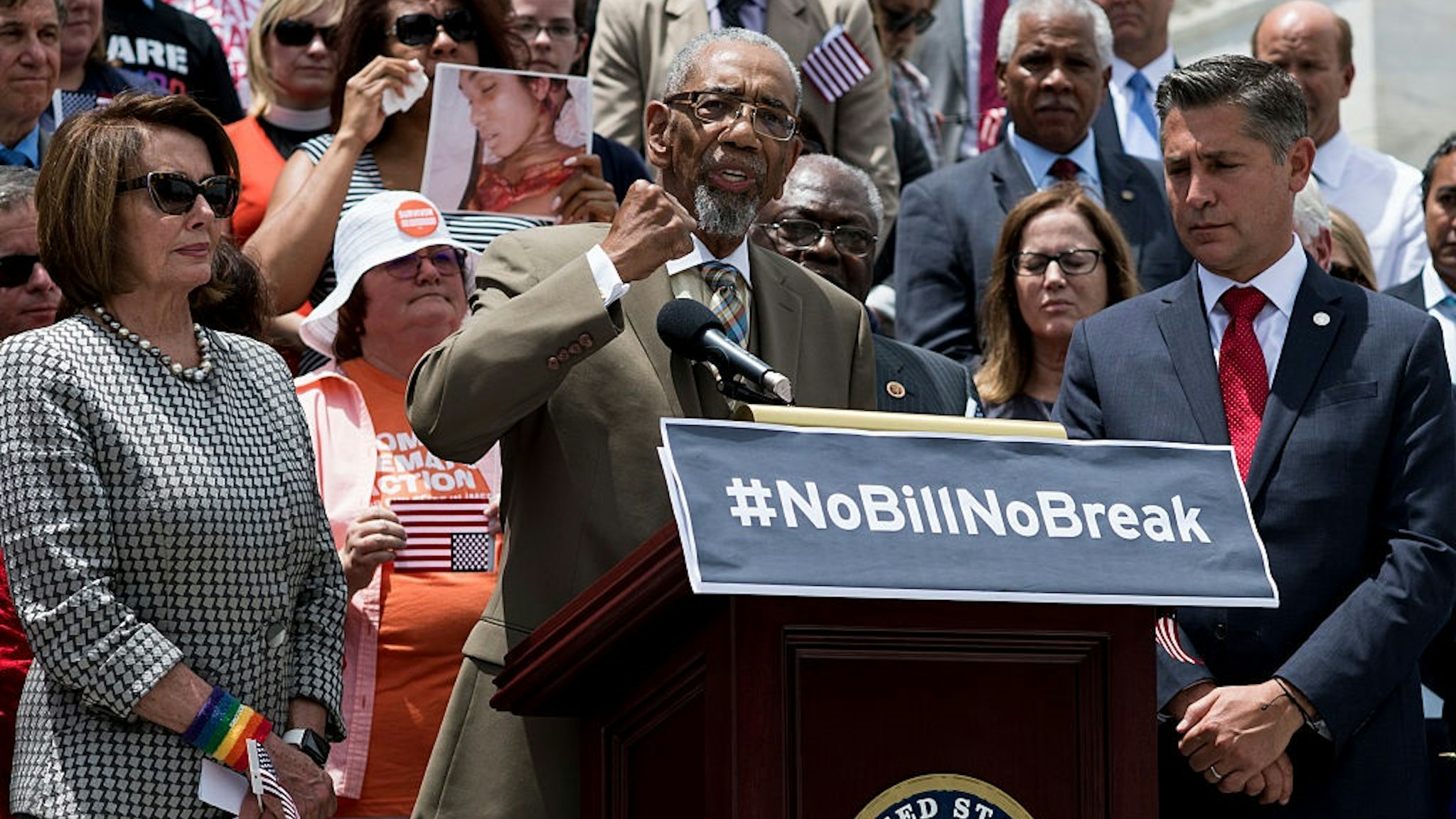 UNITED STATES - JUNE 22: Rep. Bobby Rush, D-Ill., flanked by House Minority Leader Nancy Pelosi (D-CA) and Dan Gross, president Brady Campaign to Prevent Gun Violence, speaks about his family's experience with gun violence as House Democrats rally on the House steps to speak about gun legislation on Wednesday, June 8, 2016.