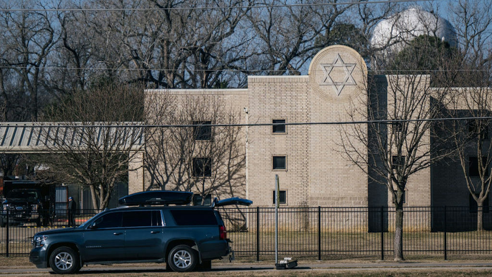COLLEYVILLE, TEXAS - JANUARY 16: Law enforcement officers conduct inspections around the Congregation Beth Israel synagogue on January 16, 2022 in Colleyville, Texas. All four people who were held hostage at the Congregation Beth Israel synagogue have been safely released after more than 10 hours of being held captive by a gunman. Yesterday, police responded to a hostage situation after reports of a man with a gun was holding people captive. (Photo by Brandon Bell/Getty Images)