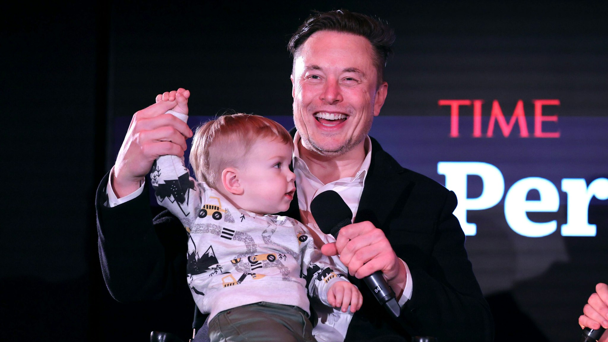 NEW YORK, NEW YORK - DECEMBER 13: Elon Musk and son X Æ A-12 on stage TIME Person of the Year on December 13, 2021 in New York City.