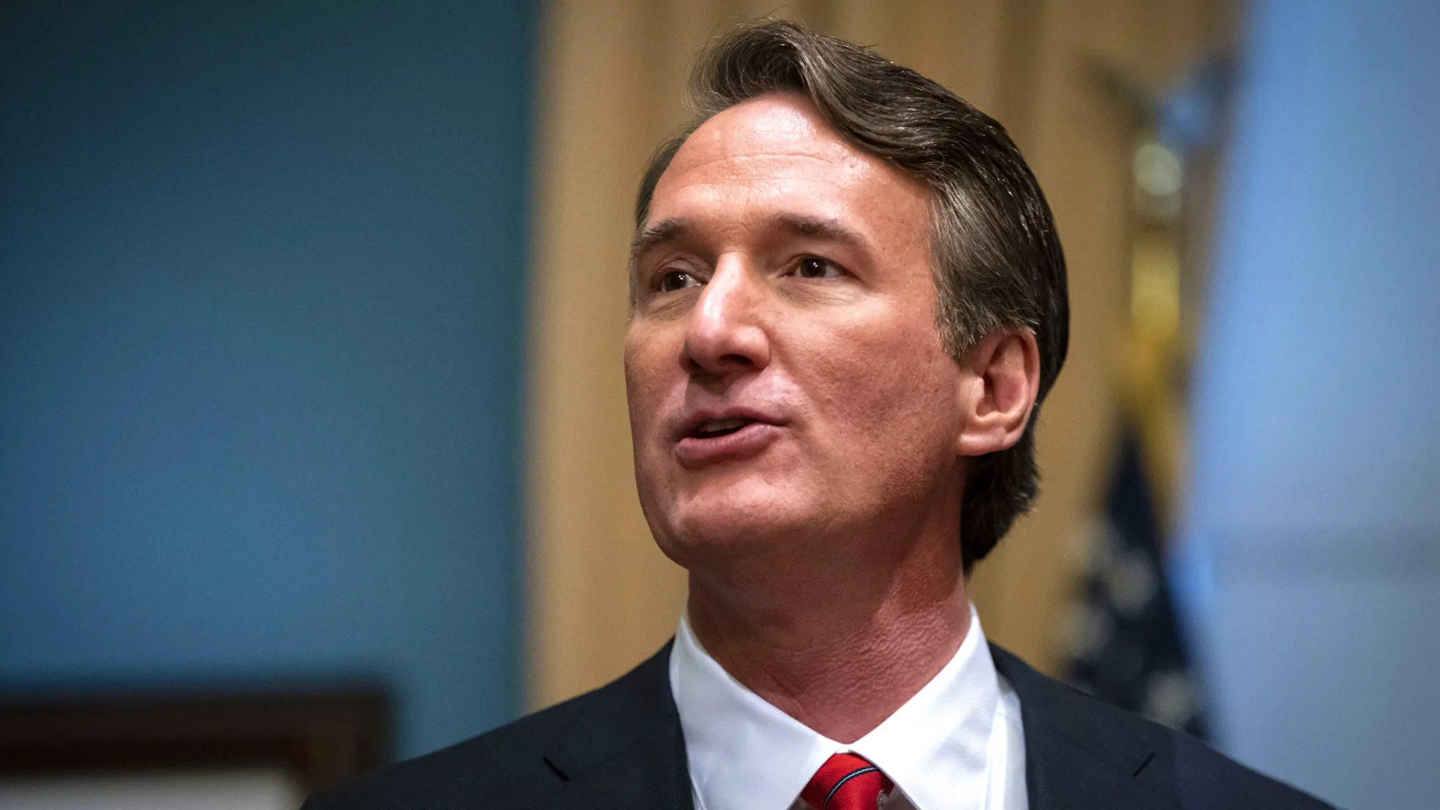 Glenn Youngkin Sworn In As Virginia Governor Glenn Youngkin, governor of Virginia, speaks prior to signing executive actions in the Virginia State Capitol in Richmond, Virginia, U.S., on Saturday, Jan. 15, 2022. Youngkin, former co-CEO of the Carlyle Group Inc., is the first Republican elected to the office since 2009.