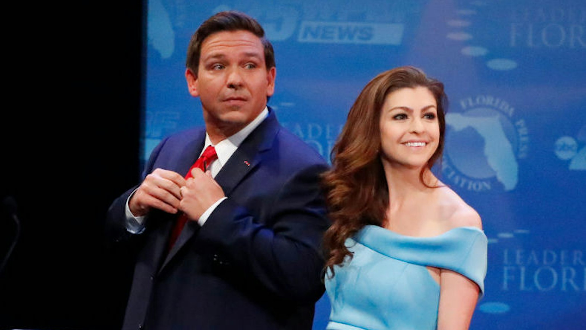 Republican Ron DeSantis and his wife Casey leave the stage after a debate with Democrat Andrew Gillum at Broward College October 24, 2018 in Davie, Florida.