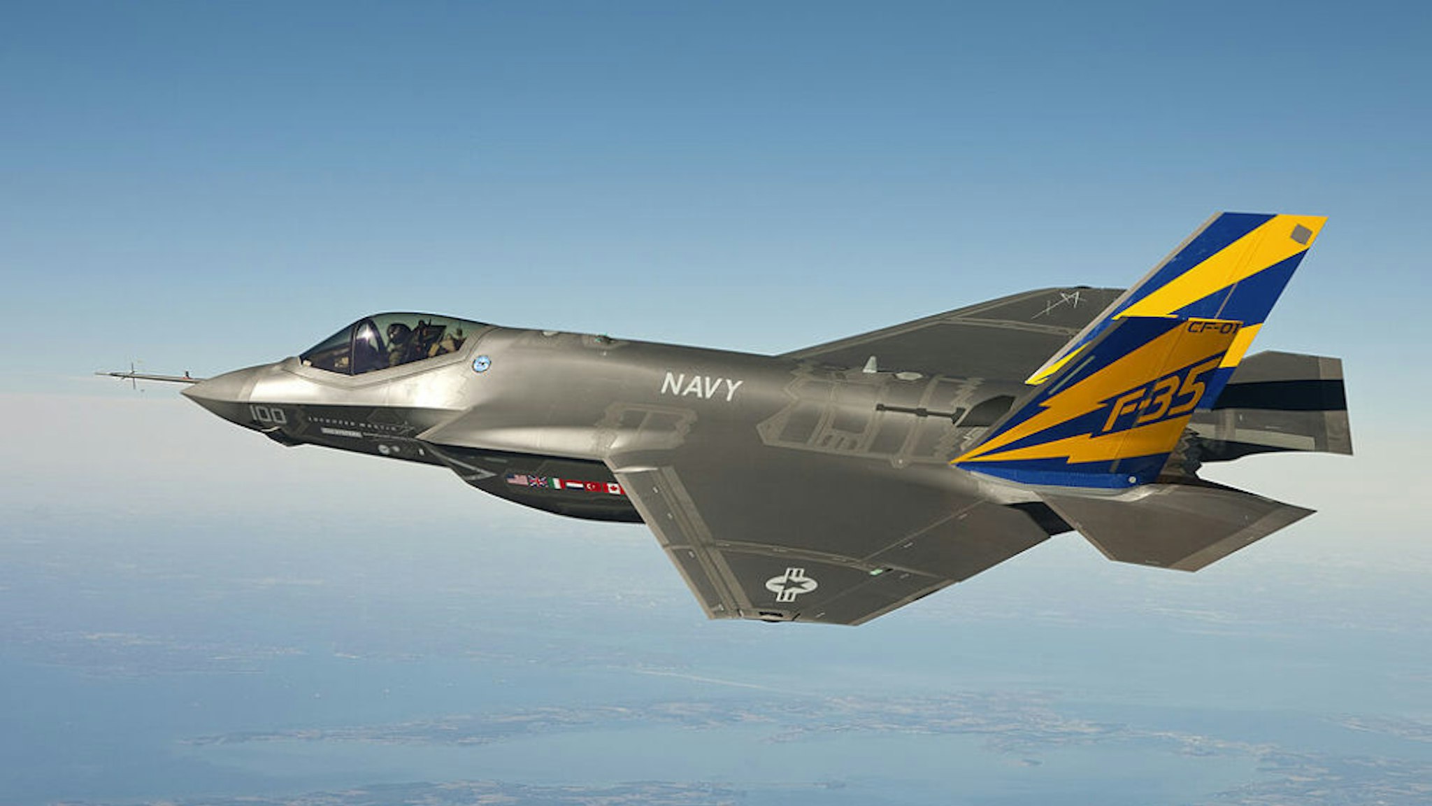 IN AIR, NAVAL AIR STATION PATUXENT RIVER, MD - FEBRUARY 11: (EDITORS NOTE: Image has been received by U.S. Military prior to transmission) In this image released by the U.S. Navy courtesy of Lockheed Martin, the U.S. Navy variant of the F-35 Joint Strike Fighter, the F-35C, conducts a test flight February 11, 2011 over the Chesapeake Bay. Lt. Cmdr. Eric "Magic" Buus flew the F-35C for two hours, checking instruments that will measure structural loads on the airframe during flight maneuvers. The F-35C is distinct from the F-35A and F-35B variants with larger wing surfaces and reinforced landing gear for greater control when operating in the demanding carrier take-off and landing environment.