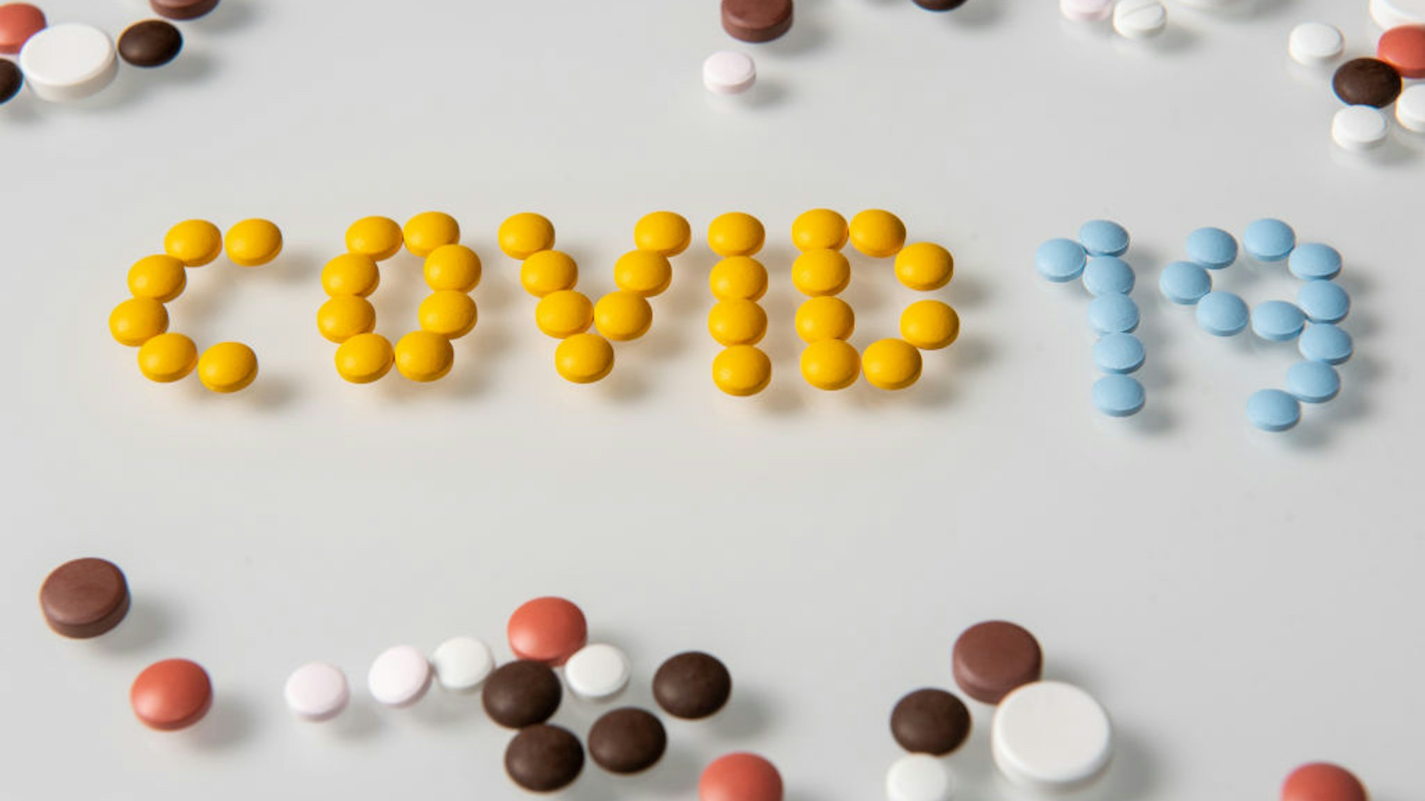 SLOVENIA - 2020/02/24: In this photo illustration, Covid-19 written with pills seen displayed. (Photo Illustration by Milos Vujinovic/SOPA Images/LightRocket via Getty Images)
