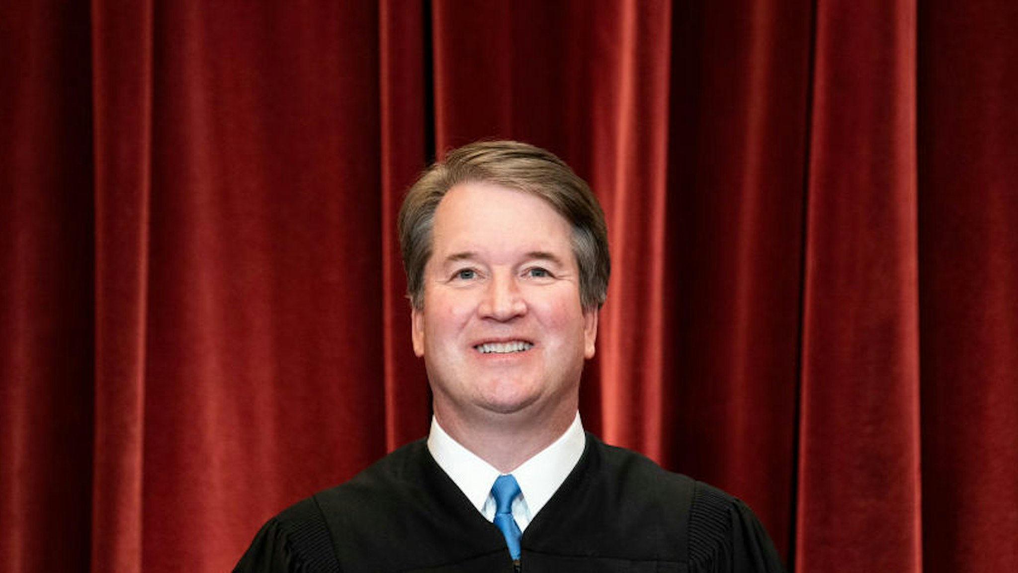 Associate Justice Brett Kavanaugh stands during a group photo of the Justices at the Supreme Court in Washington, DC on April 23, 2021.