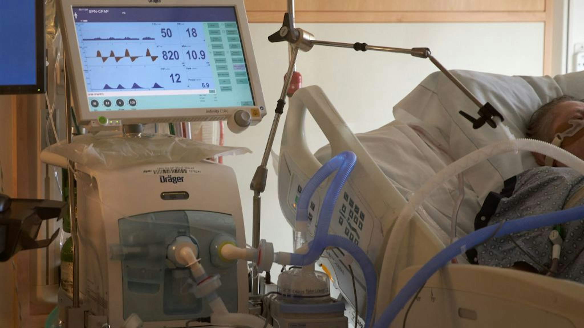 In this file photo taken on December 4, 2020, a Covid-19 positive patient is seen on a ventilator at UMass Memorial Hospital in Worcester, Massachusetts.