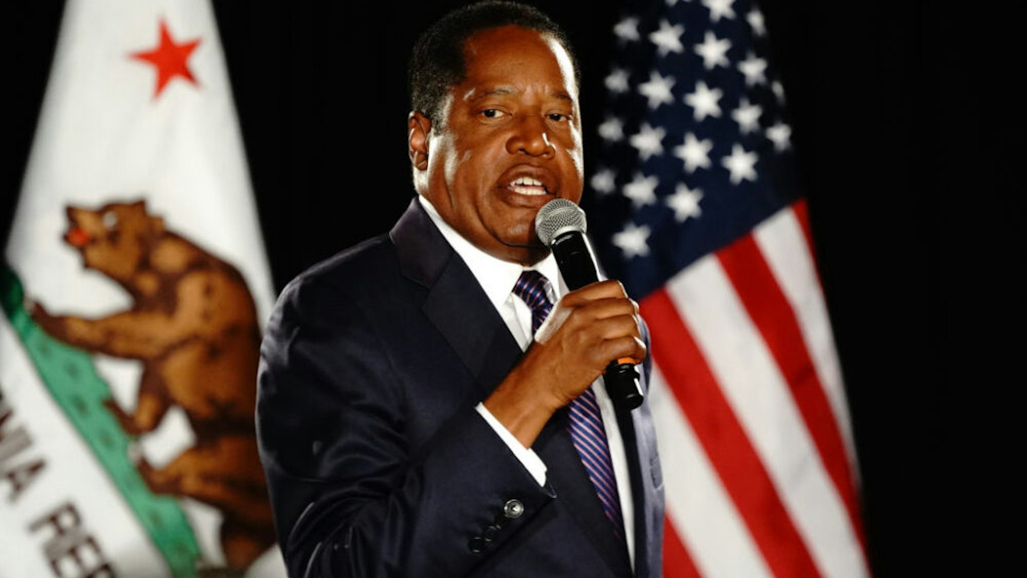 Larry Elder, Republican gubernatorial candidate for California, speaks at a campaign watch party after losing the gubernatorial recall election in Costa Mesa, California, U.S., on Tuesday, Sept. 14, 2021. California Governor Gavin Newsom beat back a recall effort, with voters resoundingly deciding to keep the first-term Democrat in office after a historic special election.