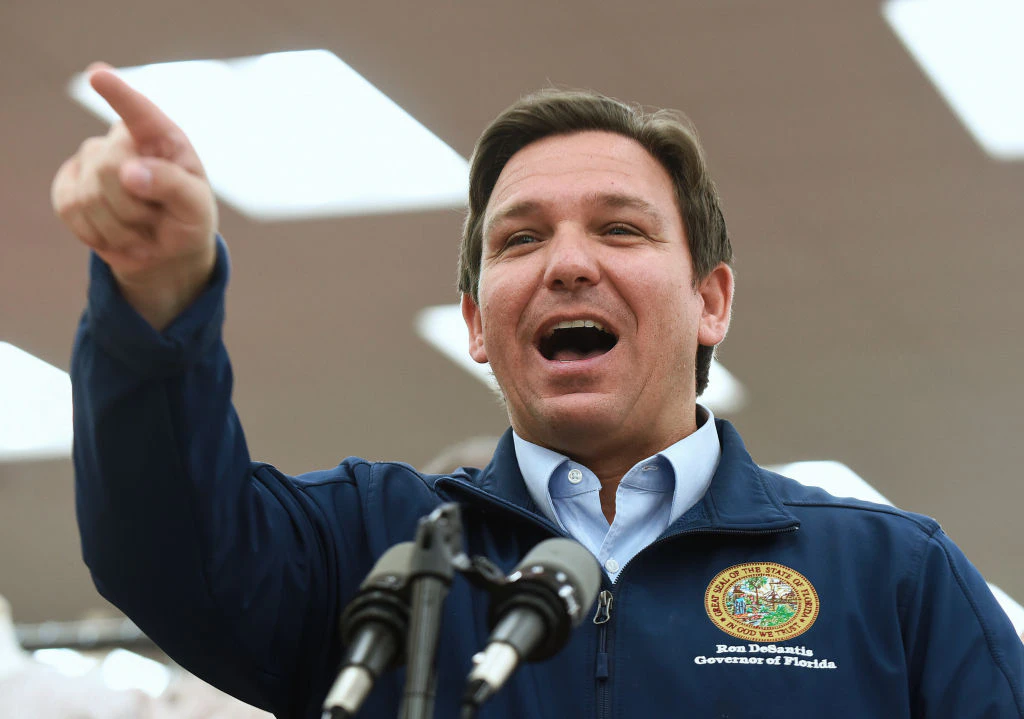 DAYTONA BEACH, FLORIDA, UNITED STATES - 2021/11/22: Florida Gov. Ron DeSantis speaks at a press conference at Buc-ee's travel center, where he announced his proposal of more than $1 billion in gas tax relief for Floridians in response to rising gas prices caused by inflation. DeSantis is proposing to the Florida legislature a five-month gas tax holiday. (Photo by Paul Hennessy/SOPA Images/LightRocket via Getty Images)