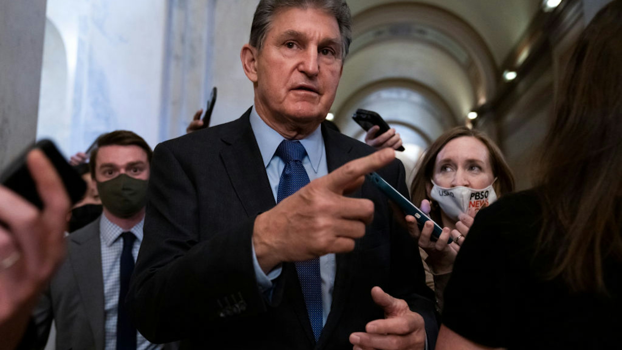 UNITED STATES - DECEMBER 15: Sen. Joe Manchin, D-W.Va., talks with reporters in the U.S. Capitol on Wednesday, December 15, 2021. (Photo By Tom Williams/CQ-Roll Call, Inc via Getty Images)