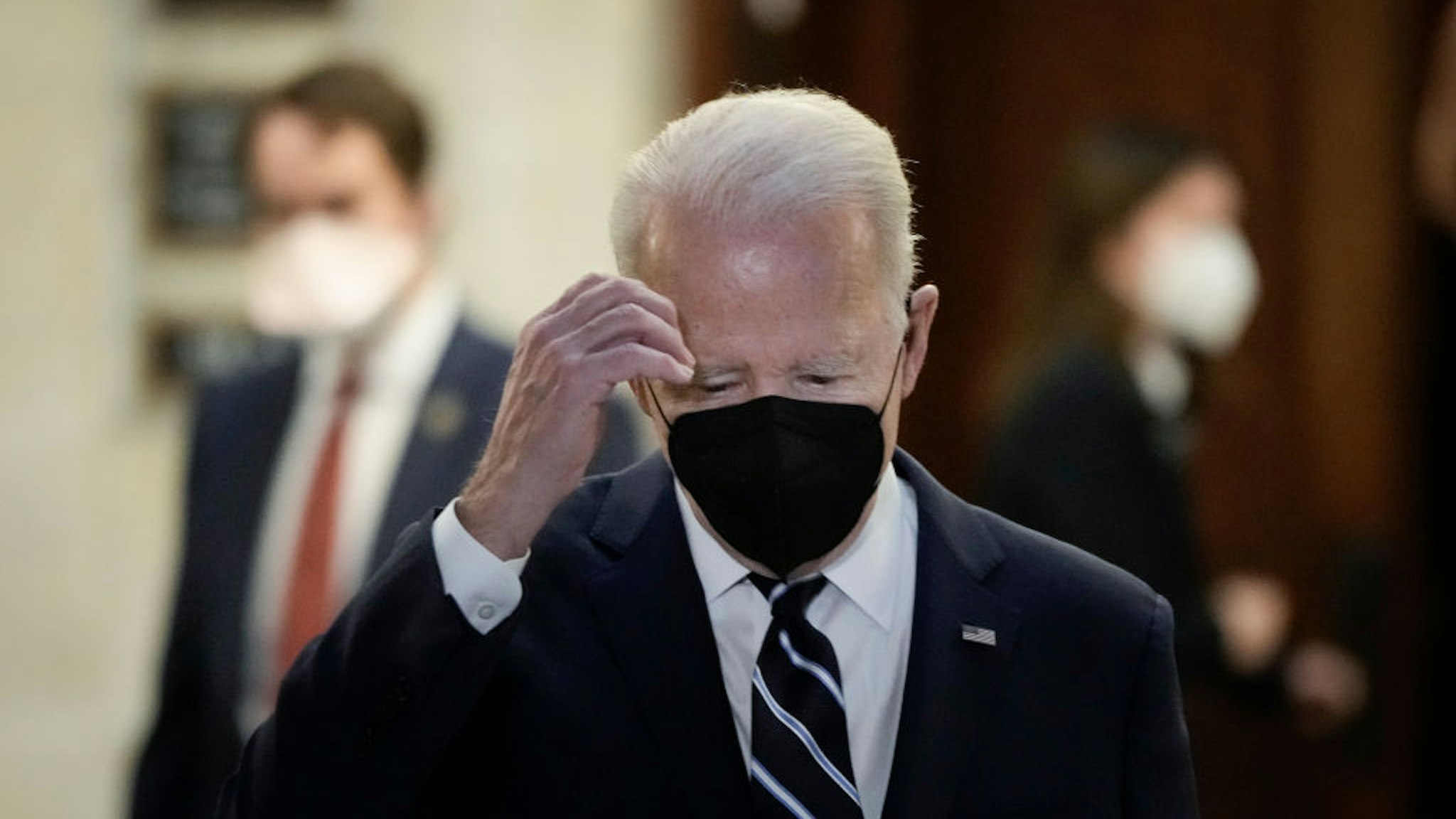 WASHINGTON, DC - JANUARY 13: U.S. President Joe Biden leaves a meeting with Senate Democrats in the Russell Senate Office Building on Capitol Hill on January 13, 2022 in Washington, DC. Biden has called on his fellow Democrats to go around Republican opposition, do away with the 60-vote threshold for advancing legislation in the Senate and pass the John Lewis Voting Rights Advancement Act and the Freedom To Vote Act. The strategy is in doubt due to opposition from Sen. Joe Manchin (D-WV) and Sen. Kyrsten Sinema (D-AZ). (Photo by Drew Angerer/Getty Images)
