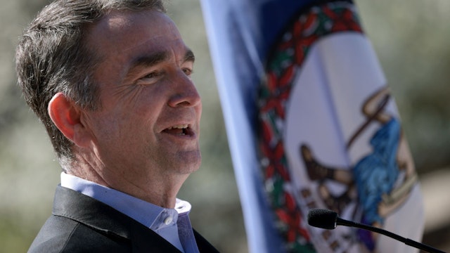 ALEXANDRIA, VIRGINIA - MARCH 30: Virginia Gov. Ralph Northam speaks at an event titled “Transforming Rail in Virginia” at the Amtrak-VRE station in March 30, 2021 in Alexandria, Virginia. The Transforming Rail in Virginia program will cost about $3.7 billion and will double Amtrak service and double Virginia Railway Express (VRE) service along the I-95 corridor, as well as work toward the separation of freight and passenger lines. (Photo by Win McNamee/Getty Images)