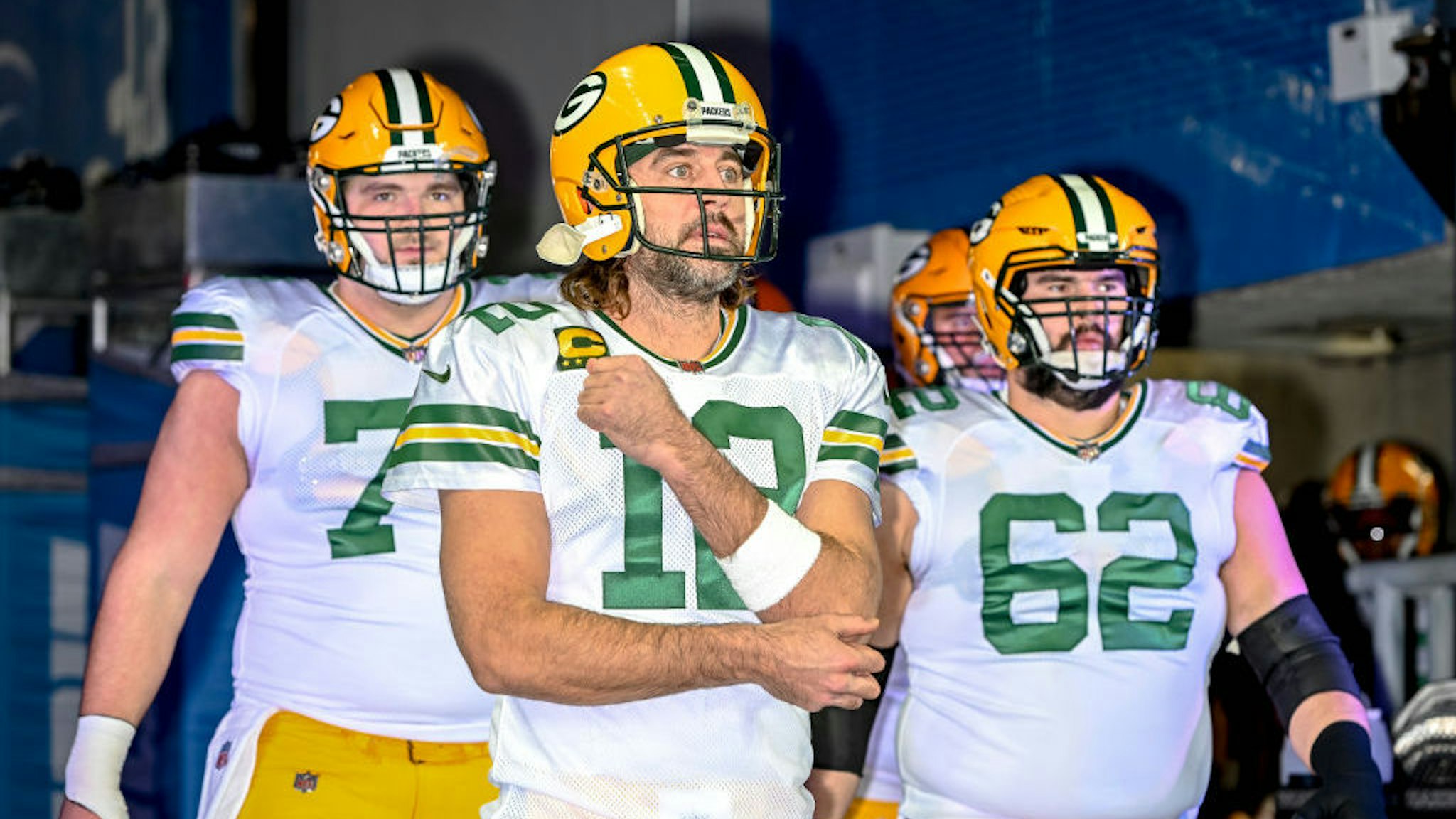 DETROIT, MICHIGAN - JANUARY 09: Aaron Rodgers #12 of the Green Bay Packers leads his team out before the game against the Detroit Lions at Ford Field on January 09, 2022 in Detroit, Michigan. (Photo by Nic Antaya/Getty Images)