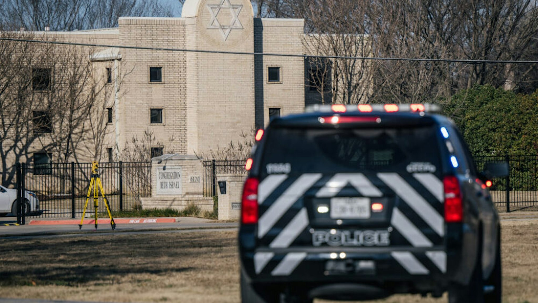 COLLEYVILLE, TEXAS - JANUARY 16: A law enforcement vehicle sits near the Congregation Beth Israel synagogue on January 16, 2022 in Colleyville, Texas. All four people who were held hostage at the Congregation Beth Israel synagogue have been safely released after more than 10 hours of being held captive by a gunman. Yesterday, police responded to a hostage situation after reports of a man with a gun was holding people captive.