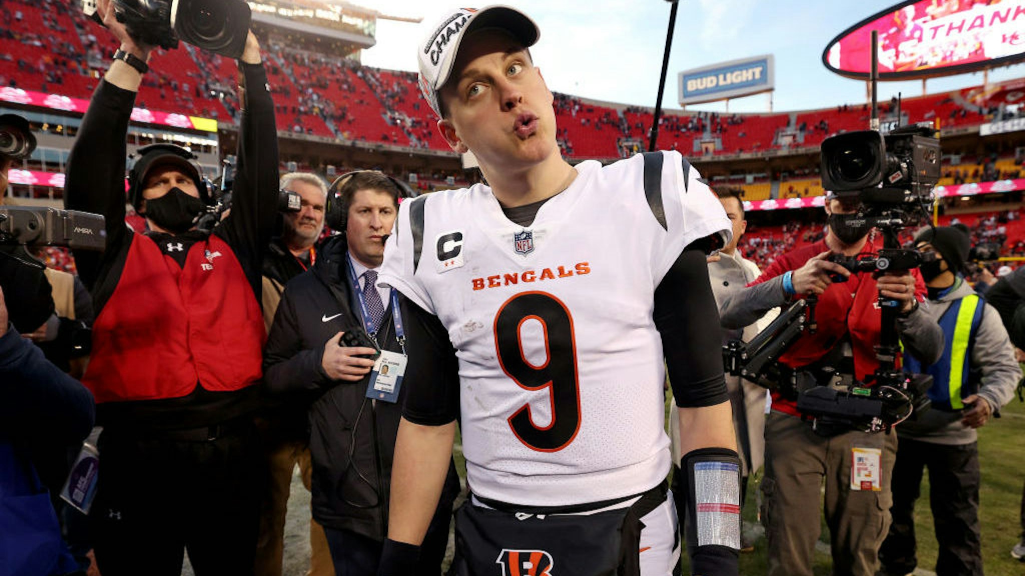 KANSAS CITY, MISSOURI - JANUARY 30: Quarterback Joe Burrow #9 of the Cincinnati Bengals reacts following the Bengals 27-24 overtime win against the Kansas City Chiefs in the AFC Championship Game at Arrowhead Stadium on January 30, 2022 in Kansas City, Missouri. (Photo by Jamie Squire/Getty Images)