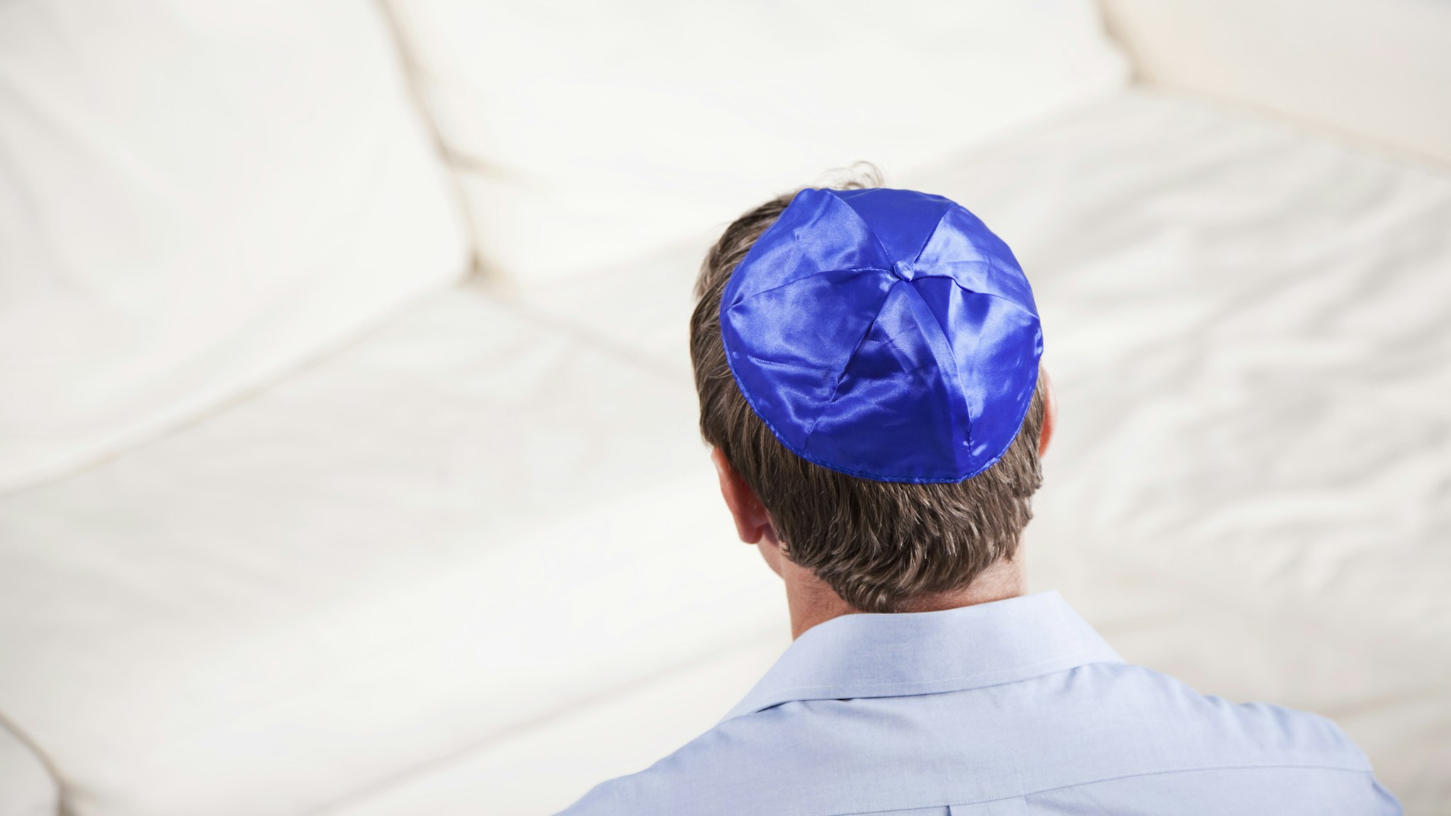Rear view of Jewish man wearing Yarmulke.