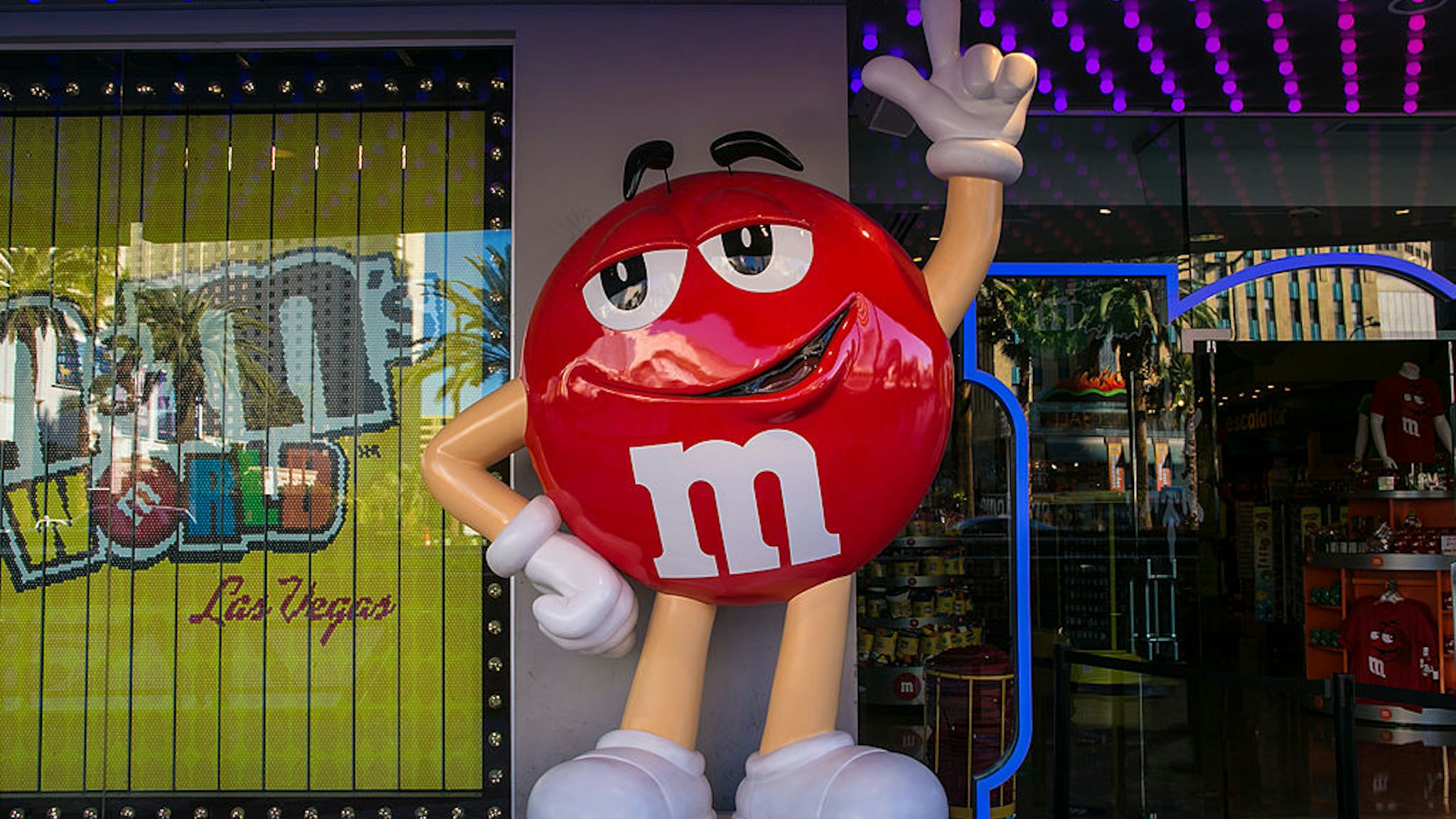 LAS VEGAS, NV - DECEMBER 14: A giant red M&amp;M candy stands in front of the store located on The Strip on December 14, 2013 in Las Vegas, Nevada. Tourism in America's "Sin City" is slowly making a comeback from the Great Recession with visitors filling the hotels, restaurants, and casinos in record numbers. (Photo by George Rose/Getty Images)