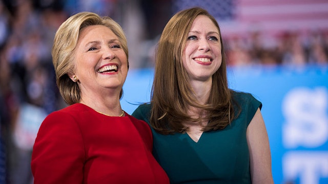 Democratic presidential nominee Hillary Clinton with her daughter Chelsea Clinton at a rally November 8, 2016 in Raleigh, North Carolina.