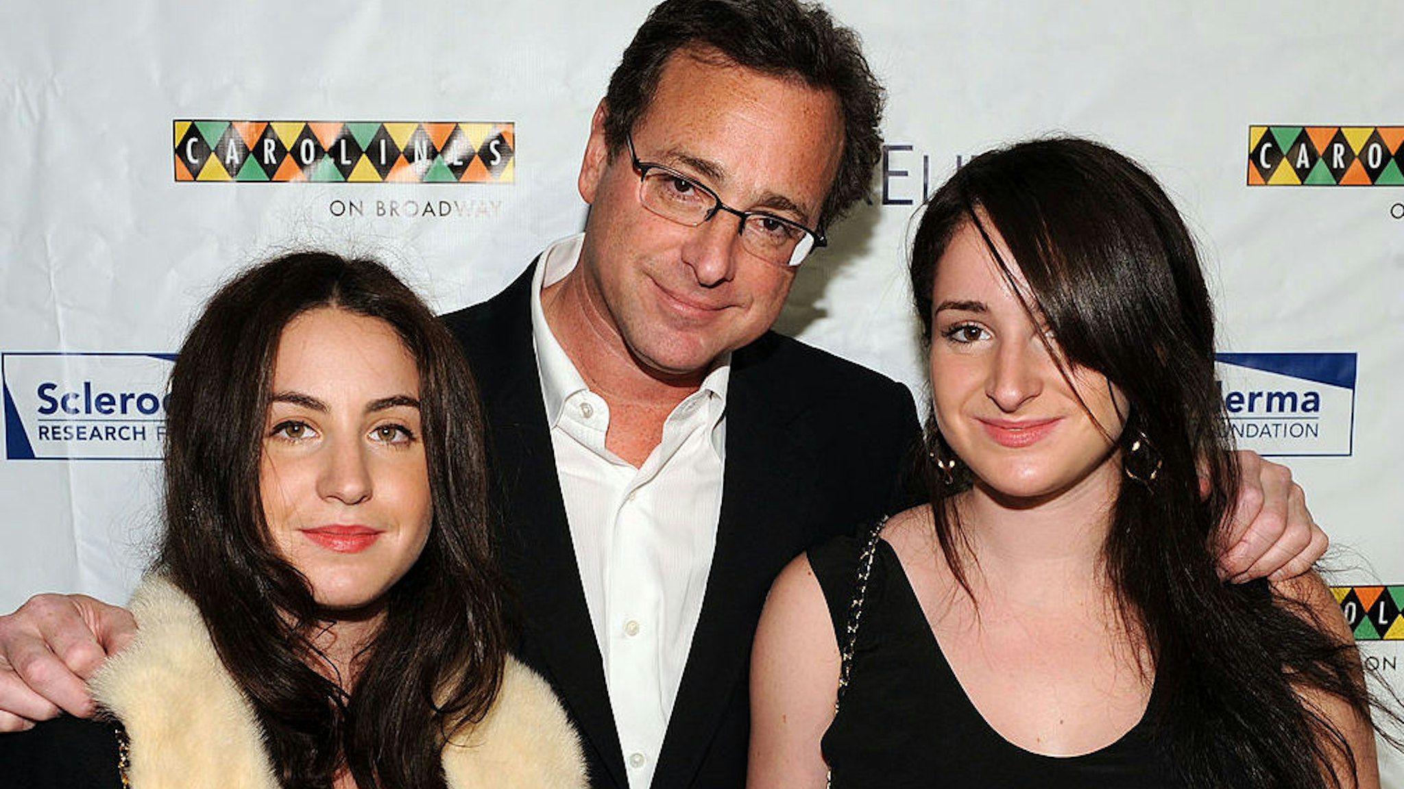 Actor and comedian Bob Saget (C) and his daughters Aubrey Saget (L) and Lara Saget attend "Cool Comedy - Hot Cuisine 2009" hosted by the Scleroderma Research Foundation at Carolines On Broadway on November 9, 2009 in New York City.