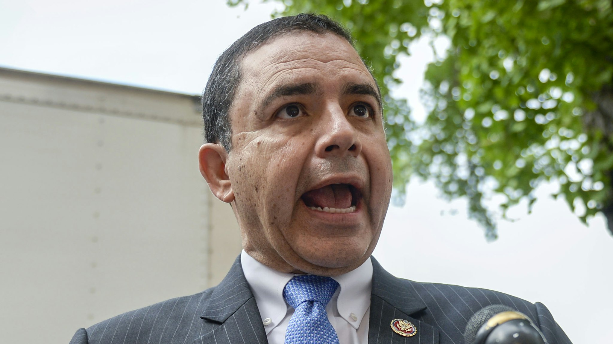 UNITED STATES - JUNE 25: Rep. Henry Cuellar, D-Texas, talks with reporters as he departs a meeting with other House Democrats to discuss potential border bill changes at the Democratic National Committee on Tuesday June 25, 2019.