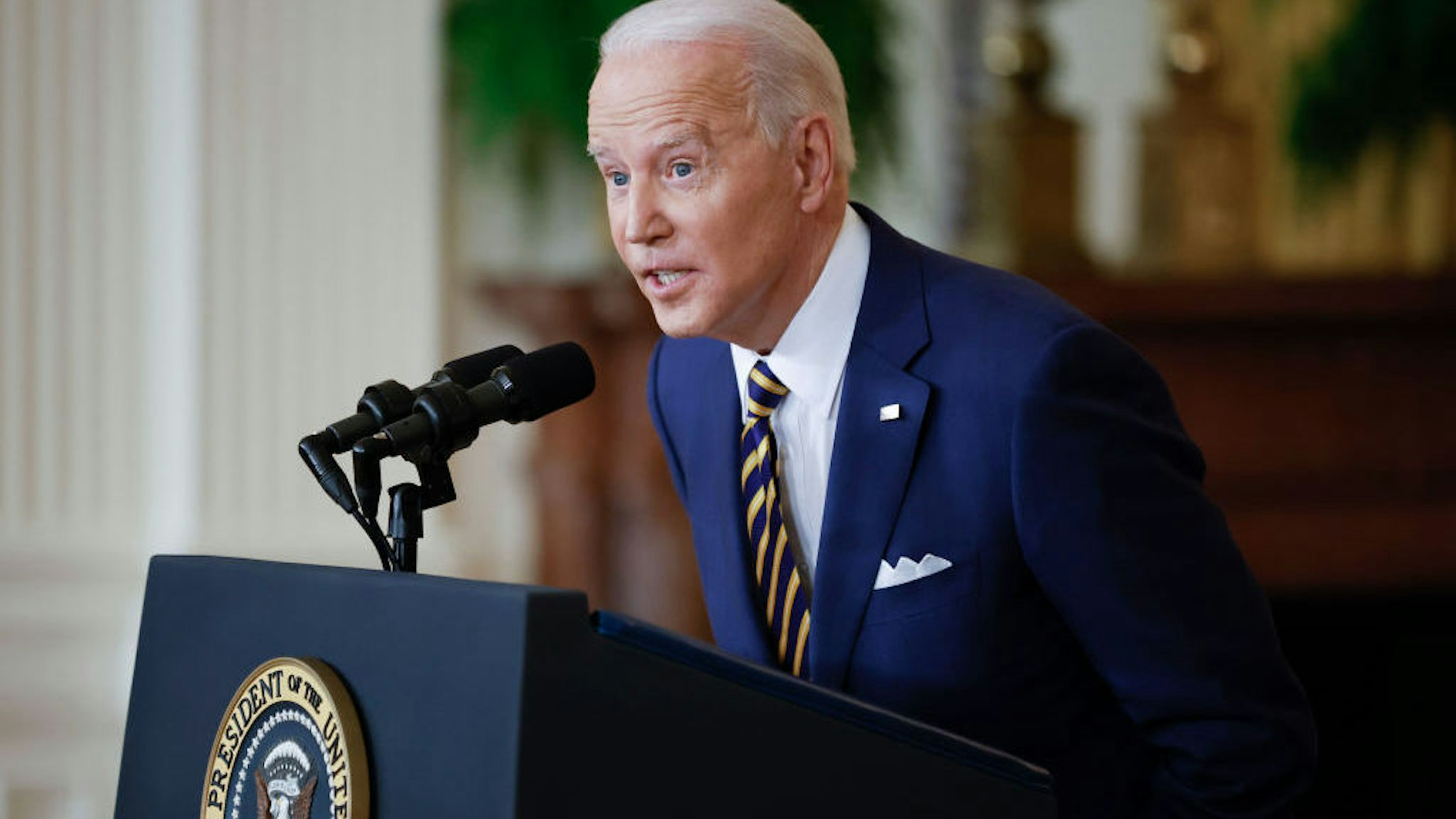 WASHINGTON, DC - JANUARY 19: U.S. President Joe Biden answers questions during a news conference in the East Room of the White House on January 19, 2022 in Washington, DC. With his approval rating hovering around 42-percent, Biden is approaching the end of his first year in the Oval Office with inflation rising, COVID-19 surging and his legislative agenda stalled on Capitol Hill. (Photo by Chip Somodevilla/Getty Images)