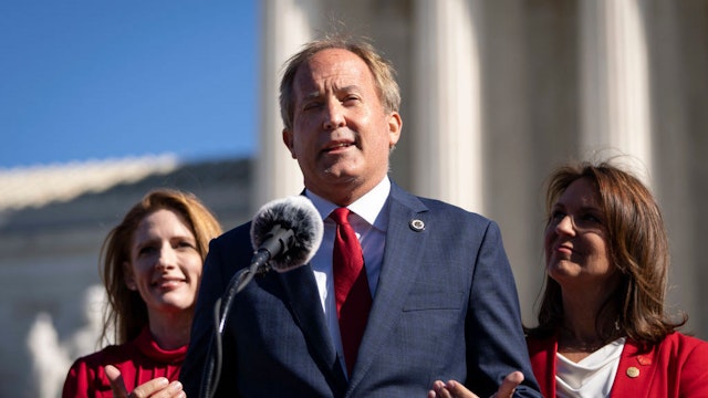 WASHINGTON, DC - NOVEMBER 01: Texas Attorney General Ken Paxton speaks outside the U.S. Supreme Court on November 01, 2021 in Washington, DC. On Monday, the Supreme Court heard arguments in a challenge to the controversial Texas abortion law which bans abortions after 6 weeks. (Photo by Drew Angerer/Getty Images)