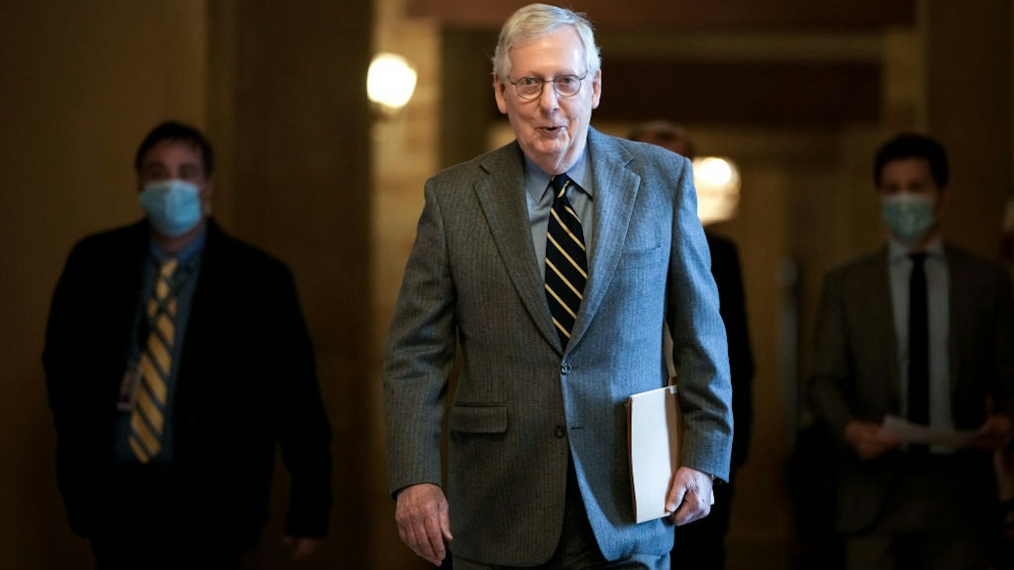 WASHINGTON, DC - JANUARY 5: Senate Minority Leader Mitch McConnell (R-KY) leaves his office and walks to the Senate floor at the U.S. Capitol on January 5, 2022 in Washington, DC.