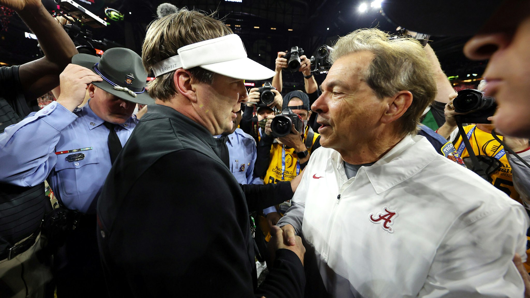 INDIANAPOLIS, INDIANA - JANUARY 10: Head Coach Nick Saban of the Alabama Crimson Tide and Head Coach Kirby Smart of the Georgia Bulldogs shake hands after the Georgia Bulldogs defeated the Alabama Crimson Tide 33-18 in the 2022 CFP National Championship Game at Lucas Oil Stadium on January 10, 2022 in Indianapolis, Indiana.