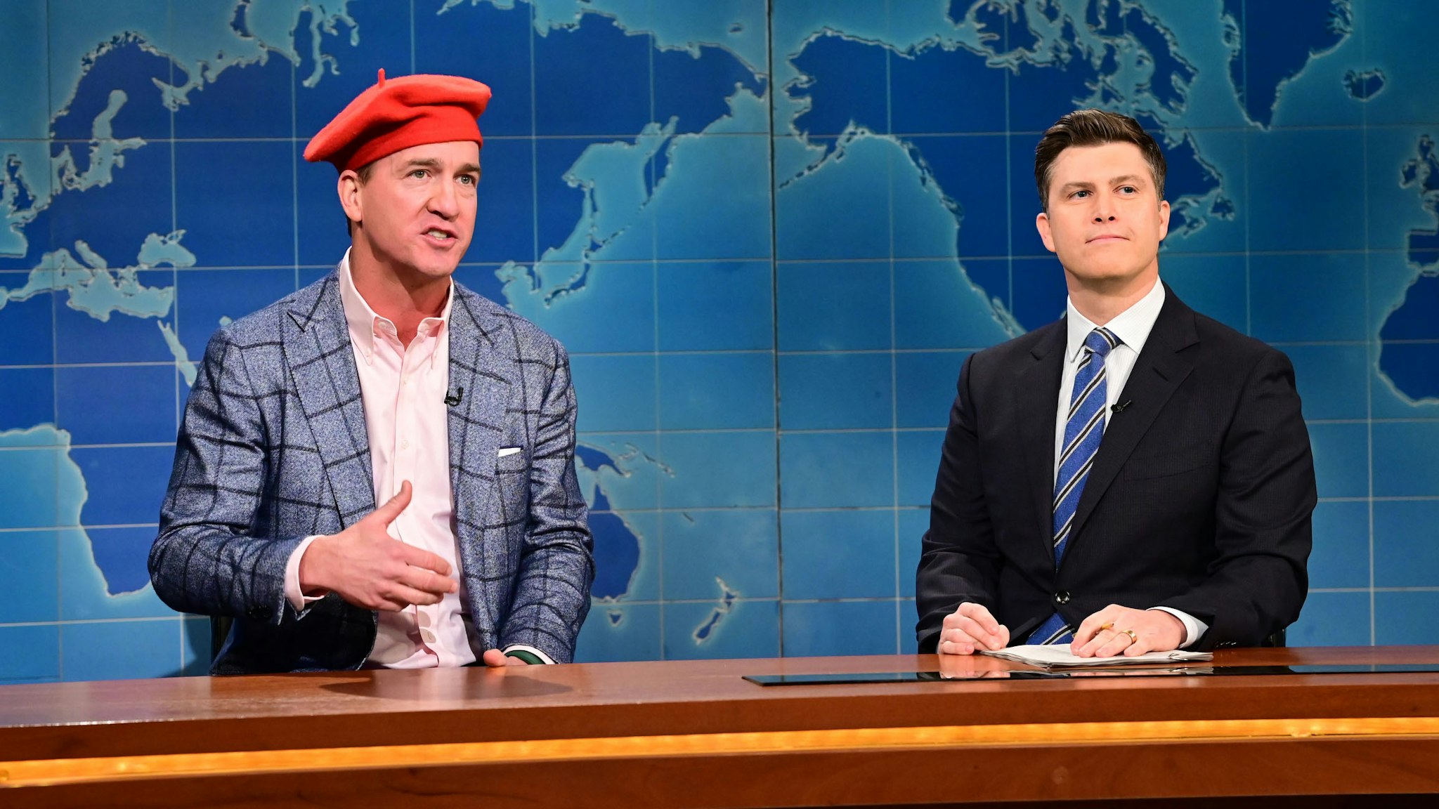 SATURDAY NIGHT LIVE -- Willem Dafoe, Katy Perry Episode 1817 -- Pictured: (l-r) Peyton Manning and anchor Colin Jost during Weekend Update on Saturday, January 29, 2022