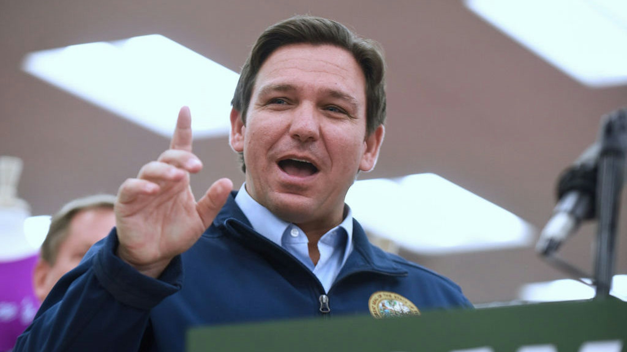 DAYTONA BEACH, FLORIDA, UNITED STATES - 2021/11/22: Florida Gov. Ron DeSantis speaks at a press conference at Buc-ee's travel center, where he announced his proposal of more than $1 billion in gas tax relief for Floridians in response to rising gas prices caused by inflation. DeSantis is proposing to the Florida legislature a five-month gas tax holiday. (Photo by Paul Hennessy/SOPA Images/LightRocket via Getty Images)