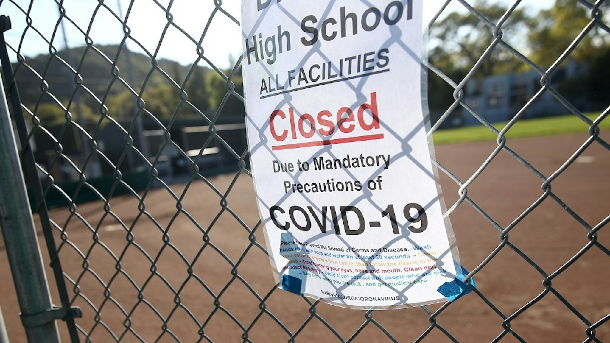 SAN ANSELMO, CALIFORNIA - MARCH 31: Signs outside Sir Francis Drake High School show that the school is closed because of the Coronavirus (COVID-19) on March 31, 2020 in San Anselmo, United States.
