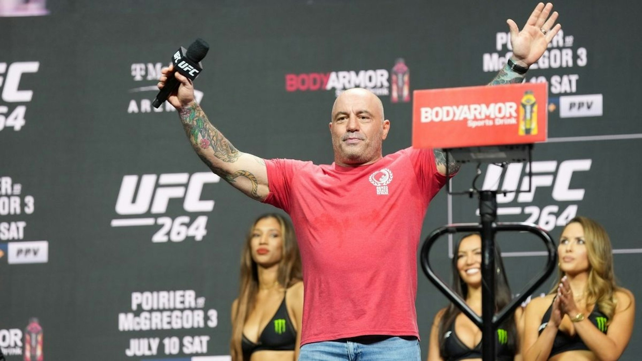 Joe Rogan waves to a packed house at the UFC 264 ceremonial weigh-in at T-Mobile Arena on July 9, 2021 in Las Vegas, NV, United States.