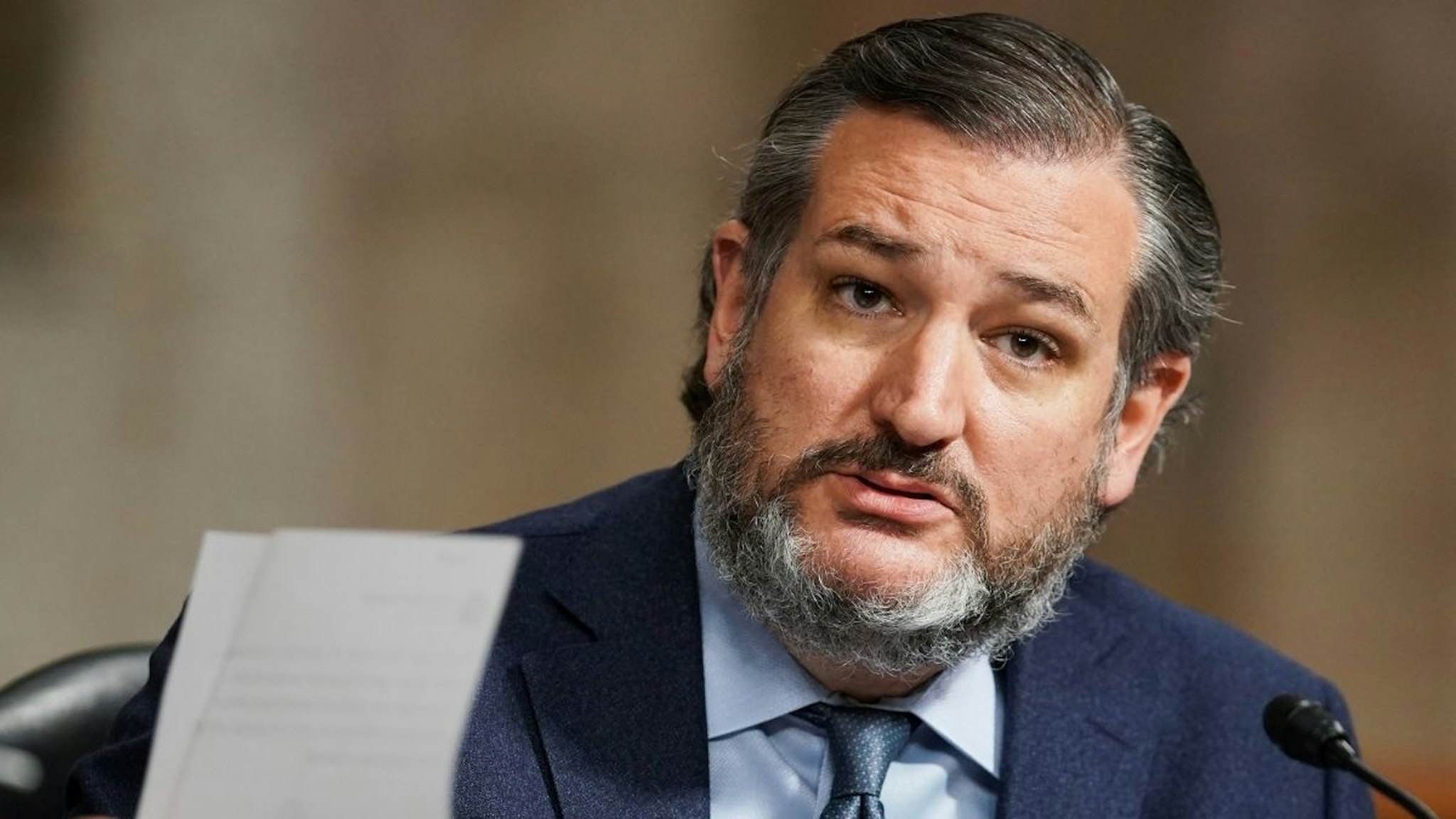 Sen. Ted Cruz (R-TX) holds up a letter from Washington, D.C., Mayor Muriel Boswer (D) during a Senate Homeland Security and Governmental Affairs & Senate Rules and Administration joint hearing to discuss the January 6th attack on the U.S. Capitol on March 3, 2021 in Washington, DC.