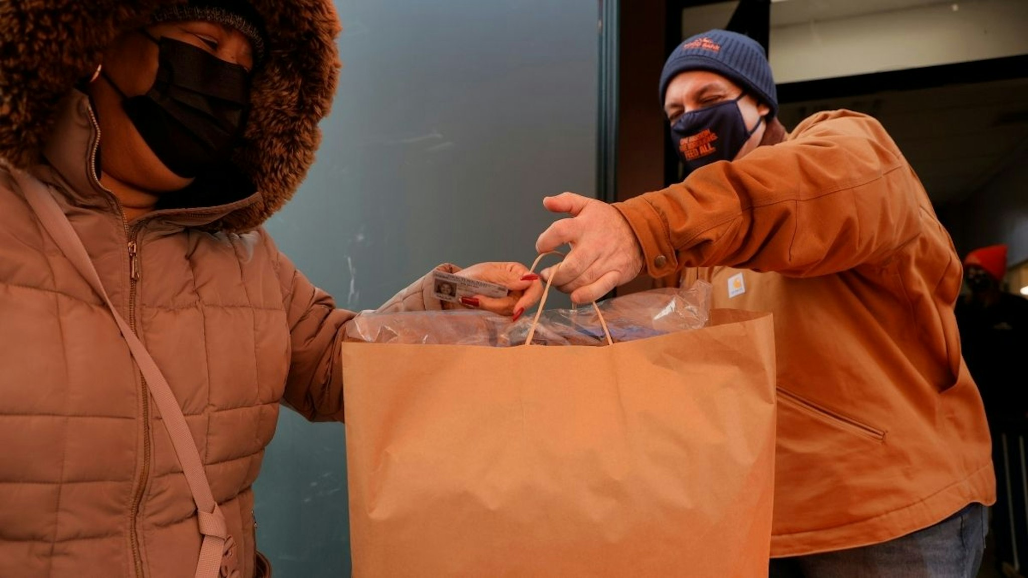 Food Bank For New York City teams up with One Warm Coat to hand out winter coats in Harlem at the Food Bank For New York City Community Kitchen and Pantry on December 10, 2021 in New York City.