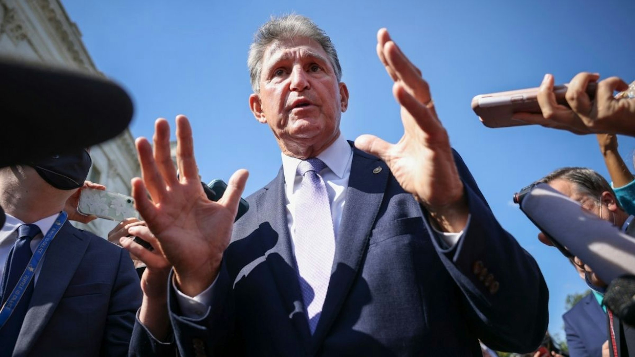 Joe Manchin (D-WV) speaks to reporters outside of the U.S. Capitol on September 30, 2021 in Washington, DC.