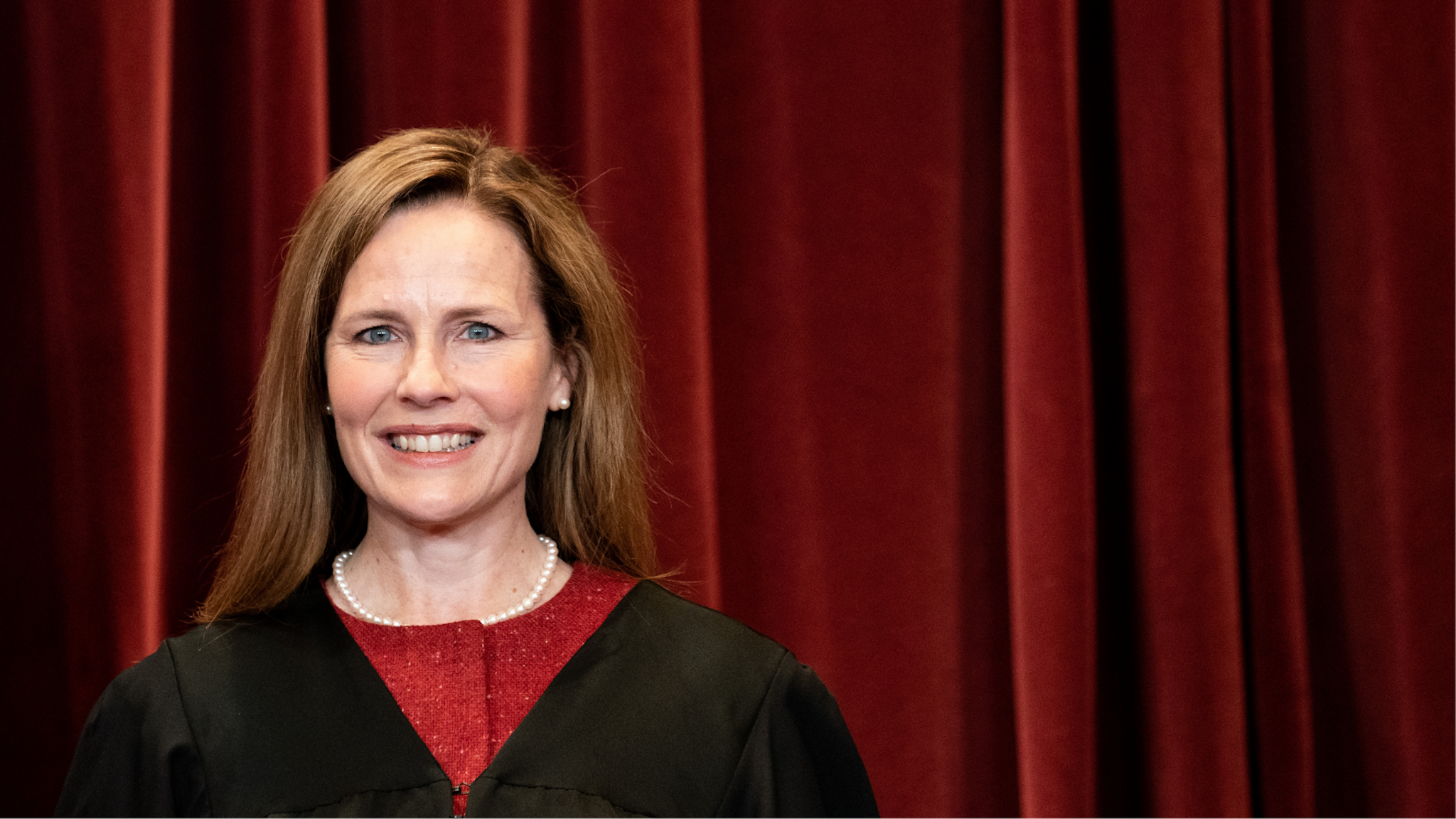 Associate Justice Amy Coney Barrett stands during a group photo of the Justices at the Supreme Court in Washington, DC on April 23, 2021. (