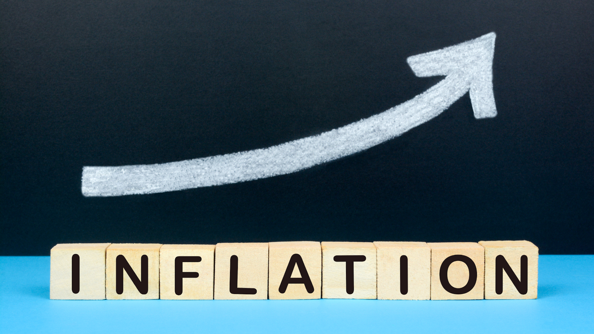 Concept of Inflation. Rising chart on the background with the text inflation.